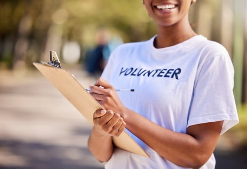 woman-hands-and-volunteering-checklist-in-nature-2023-11-27-05-11-36-utc